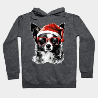 Magical Christmas Chihuahua in the snow: cute four-legged friend with festive hat Hoodie